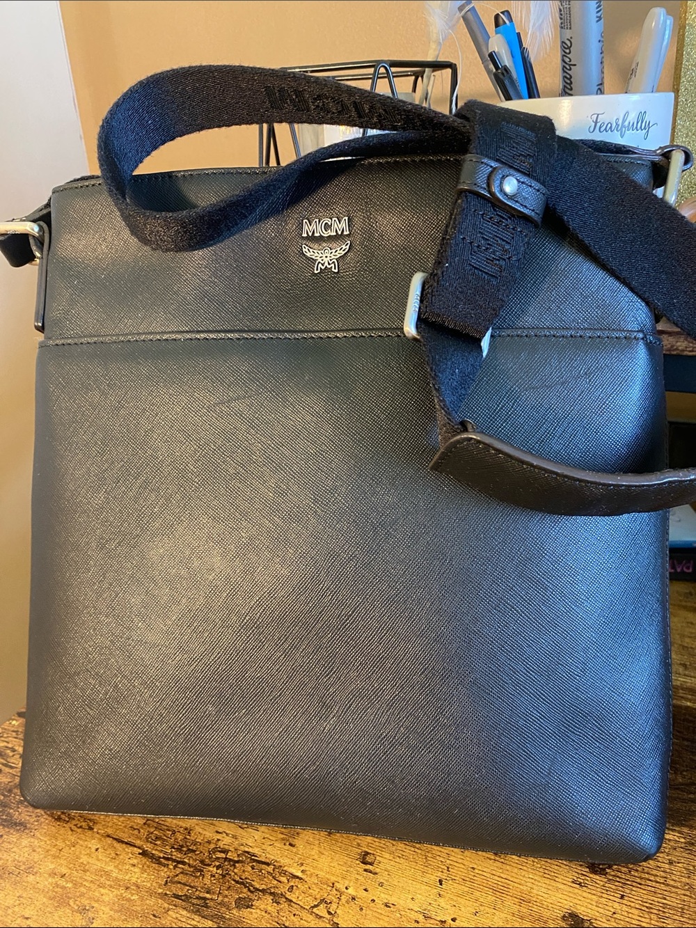 Pre-owned MCM Black Leather Crossbody Bag with Silver Logo